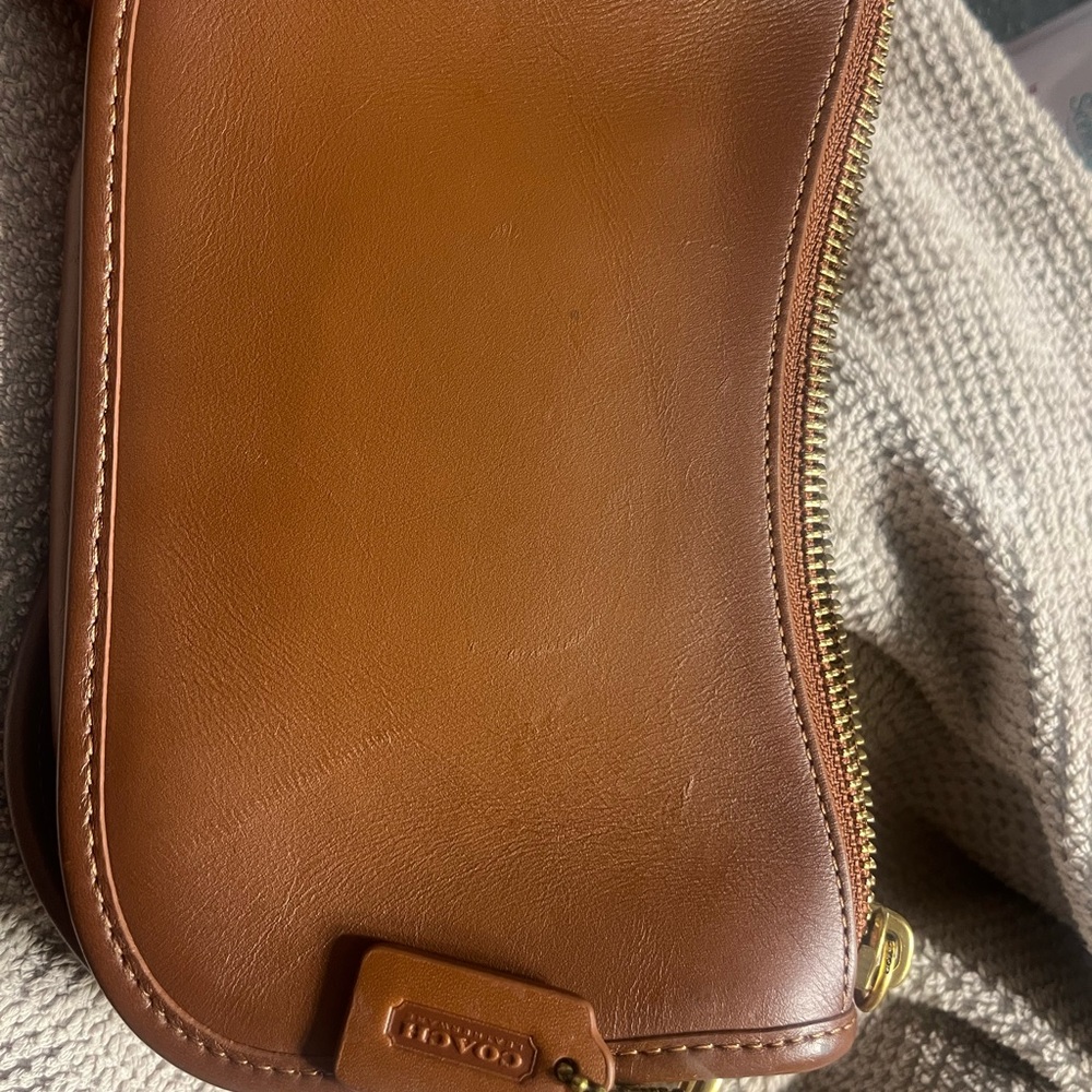 Small , coach shoulder bag . Never worn brand new